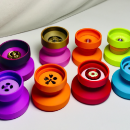 The image shows a collection of colorful cannabis grinders from the hydroponics company Vivosun. The grinders come in a variety of colors and are marketed as “spice grinders with a pollen catcher.”