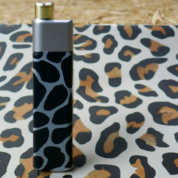 A sleek black vaporizer with an animal print design, measuring 4.1 inches tall, 1.85 inches wide, and 0.48 inches thick. It features a ceramic chamber, a hybrid heating system, and a powerful 1300mAh battery.