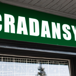 description: A storefront with a green cross and the words "Cannabis Dispensary" in bold letters.